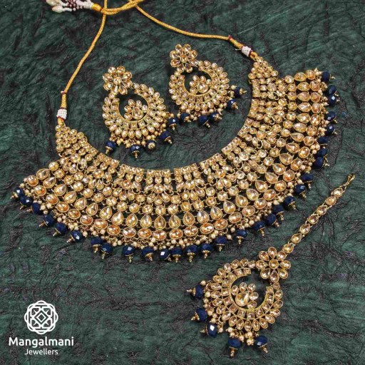 Magnificent Navy Blue Coloured With Ethnic Work AD Kundan Necklace Set Adorned With AD Kundan