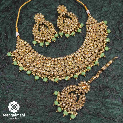 Pretty Green Coloured With Traditional Work AD Kundan Necklace Set Studded With AD Kundan