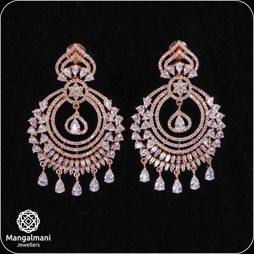 Prettyish White Coloured With Ethnic Work CZ Earrings Embellished With Cubic Zirconia