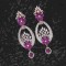 Alluring Rani Coloured With Western Look Designer Work CZ Earrings Studded With Cubic Zirconia
