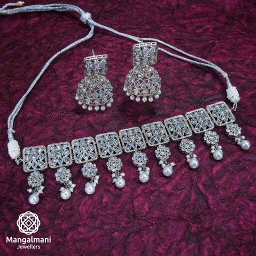 Alluring Silver Coloured With Traditional Work Polki Necklace Set Studded With Reverse Ad
