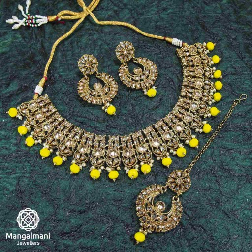 Resplendent Yellow Coloured With Traditional Work Polki Necklace Set Studded With Reverse Ad