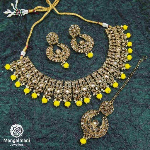 Resplendent Yellow Coloured With Traditional Work Polki Necklace Set Studded With Reverse Ad