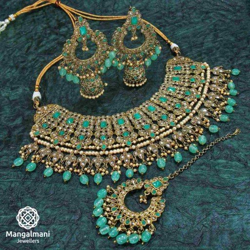 Ravishing Green Coloured With Traditional Work Polki Necklace Set Adorned With Reverse Ad