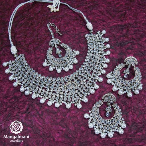 Alluring Silver Coloured With Designer Stone Work Polki Necklace Set Studded With Reverse Ad