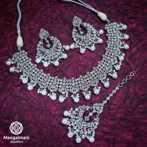 Attractive Silver Coloured With Ethnic Work Polki Necklace Set Decorated With Reverse Ad
