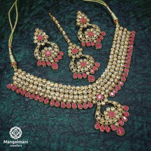 Charismatic Gajri Coloured  Polki Necklace Set AdornedPolki With AD Kundan