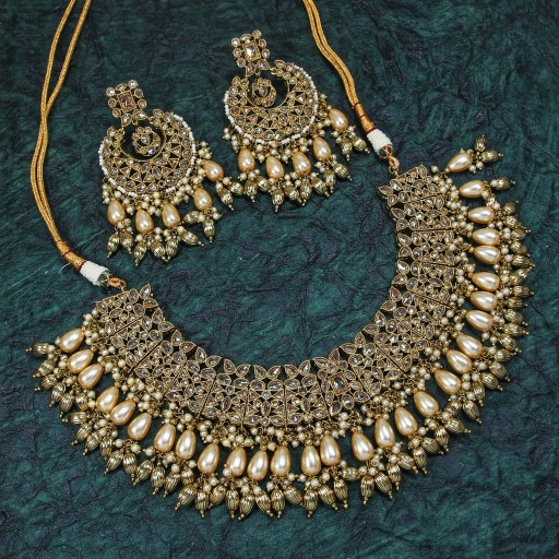 Magnificent With Ethnic Work Polki Necklace Set Adorned With Reverse AD